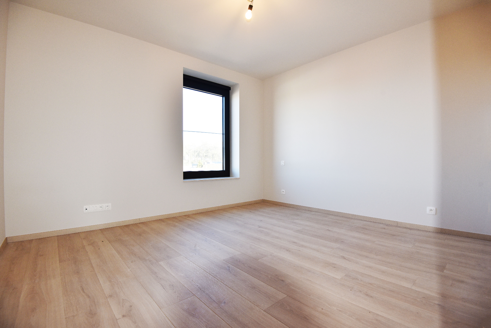 Nieuwbouwappartement, 2 slpks, autostaanplaats en terras te MALDEGEM centrum. 