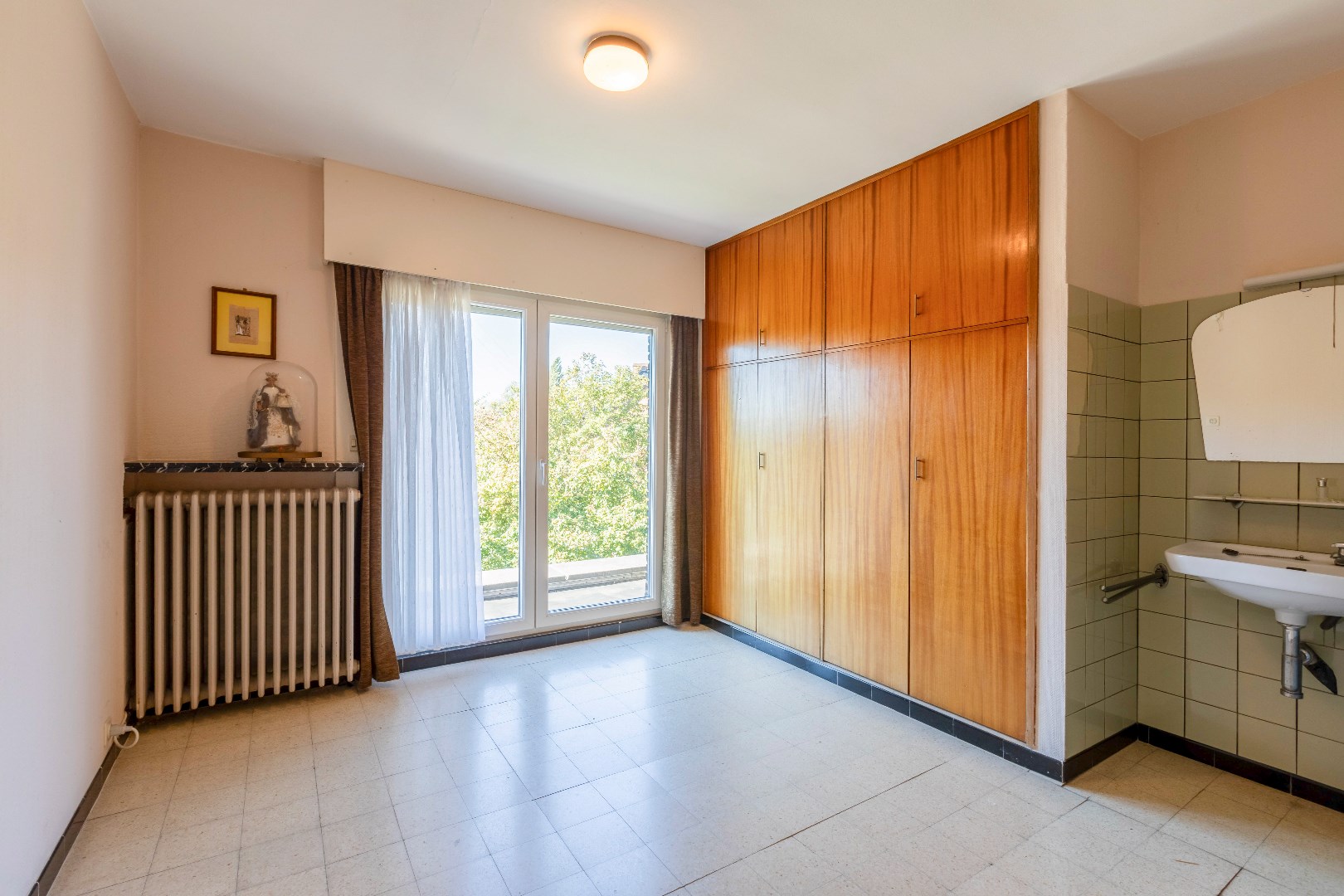 VERKOCHT - Ruime half open bebouwing met garage te Merelbeke 