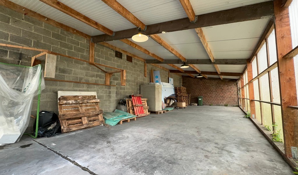 Handelspand met garage te koop in Merelbeke-Melle