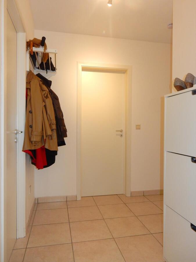 Gezellig gelijkvloersappartement met zonnige tuin en garage 