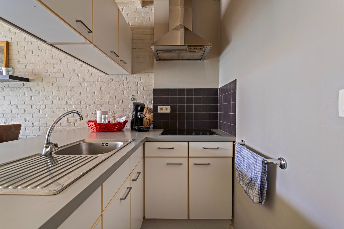 Gelijkvloers appartement met berging. 