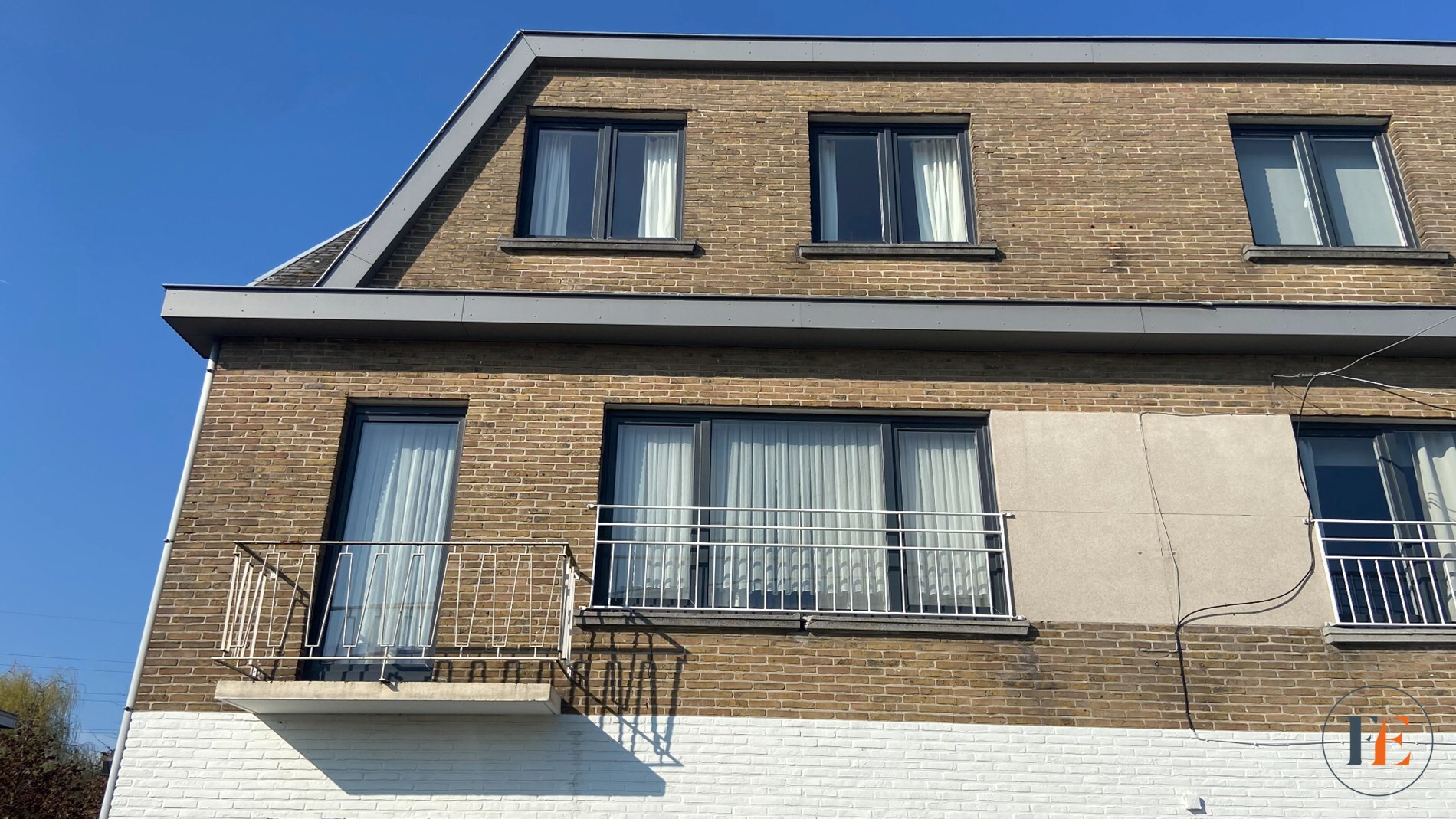 Appartement met privatieve tuin en garage 