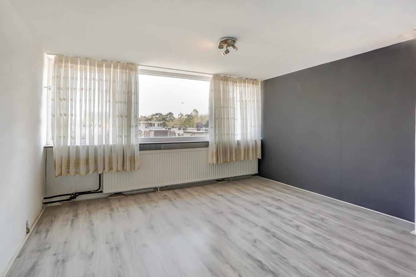 Tussenwoning met 4 slaapkamers en ruime garage van 6 x 5 m! 