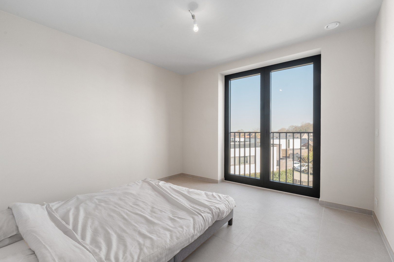 Nieuwbouwappartement met twee slaapkamers, terras en ondergrondse autostaanplaats te koop in Zulte 