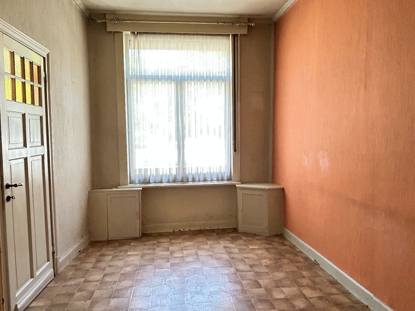 Stadswoning met 3 slaapkamers en koer 
