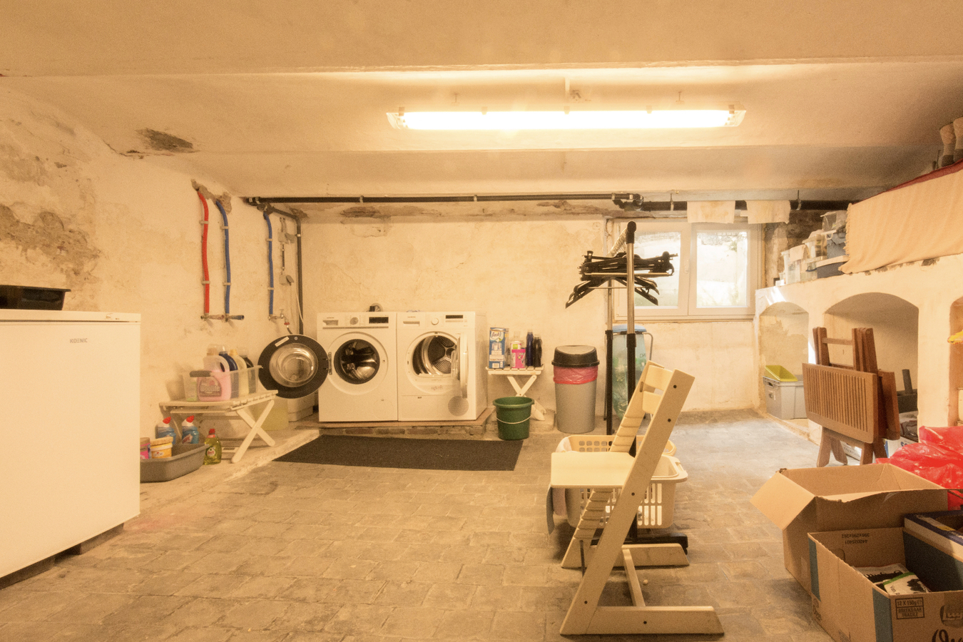 Gelijkvloers luxe 2-slk-appartement met privatieve tuin. 