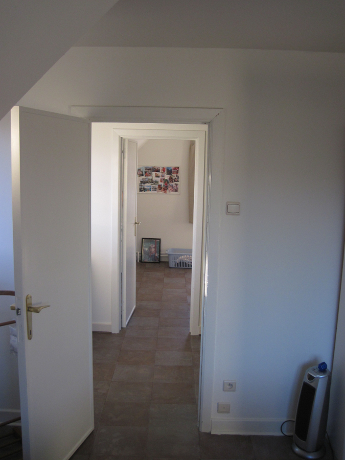 Degelijke én gezellige woning. Met tuin en met garage. 