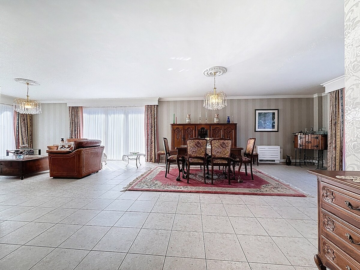 Energiezuinig gelijkvloersapp. met tuintje en garage te centrum Wetteren 