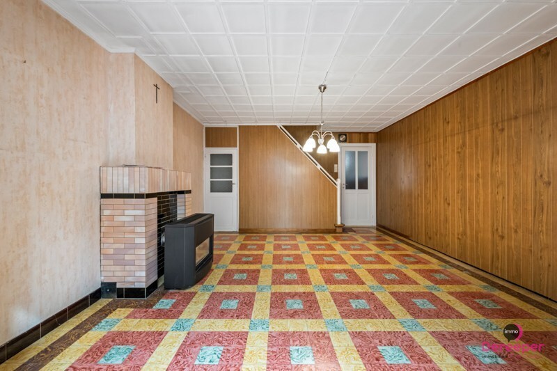 Te renoveren rijwoning op centrale ligging met leuke zuidgerichte tuin 