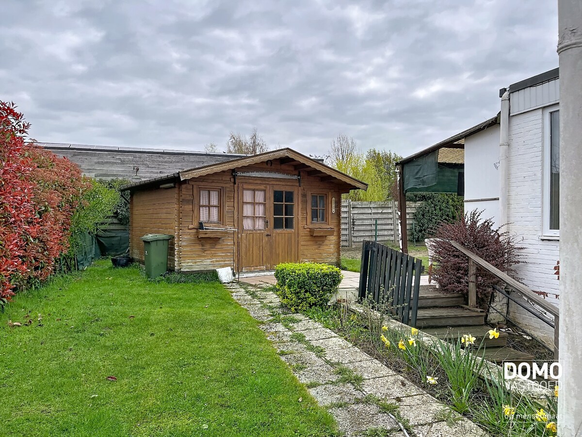 WONING MET TWEE SLAAPKAMERS, INPANDIGE GARAGE OP EEN PERCEEL VAN 5A35CA IN SINT-TRUIDEN 