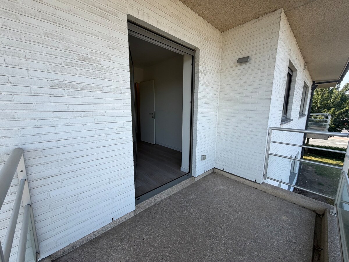 2 slpk-appartement nabij allerhande voorzieningen. 