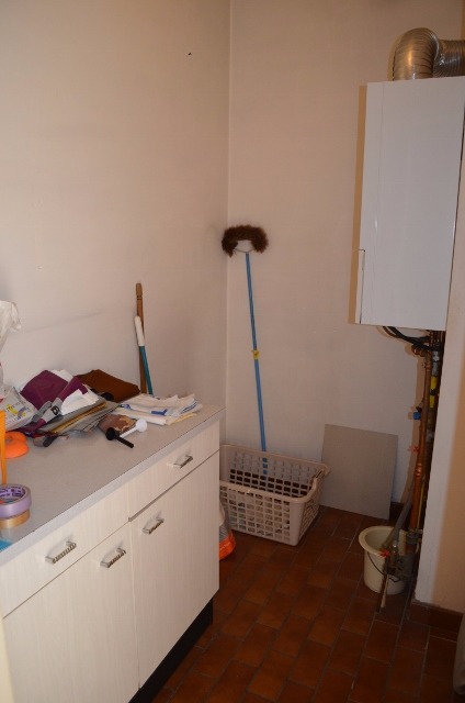 Gelijkvloers app met 2 slpks en garage te centrum Eeklo 