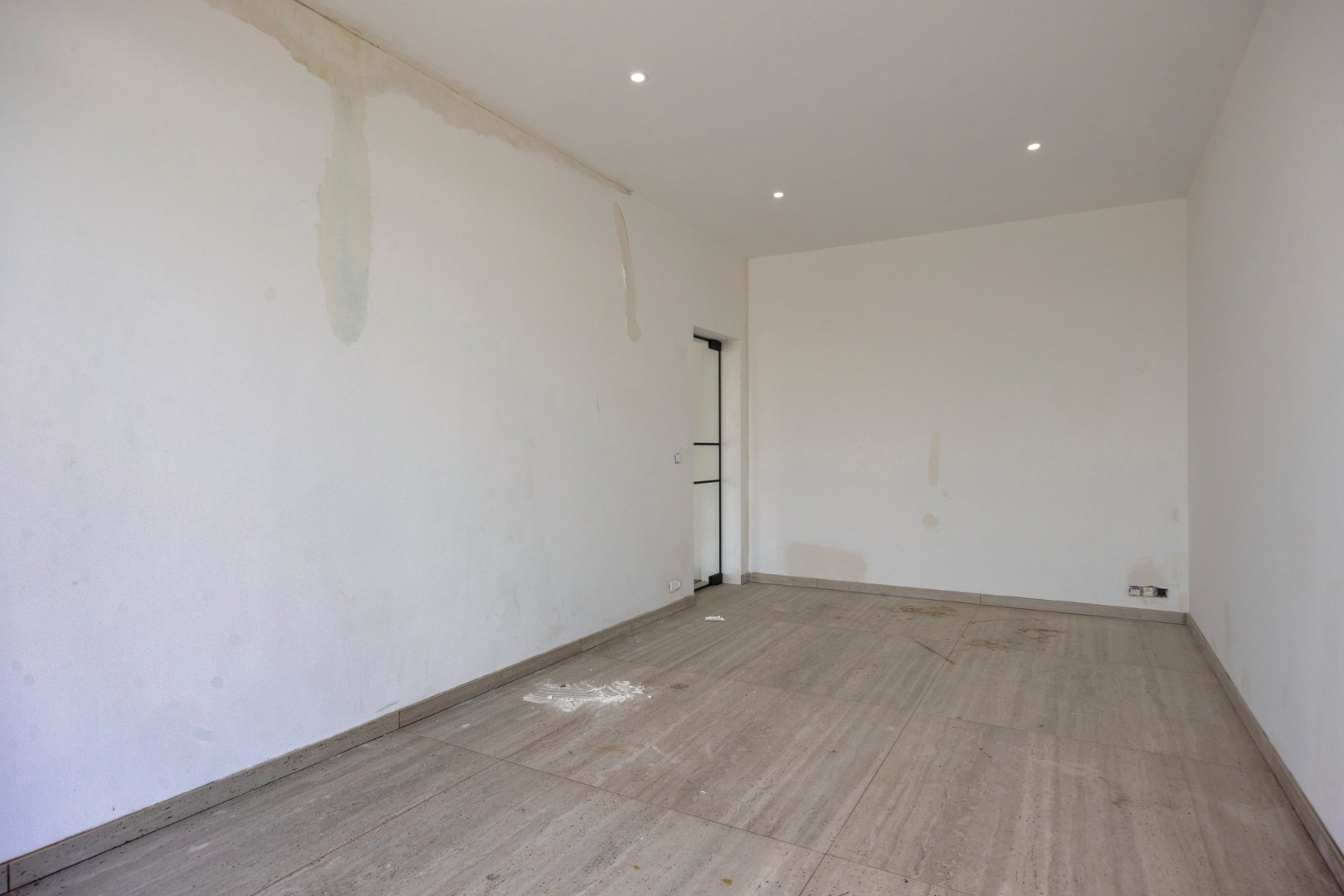 Gerenoveerd handelshuis met aangename tuin en garage op goede ligging in Herent 