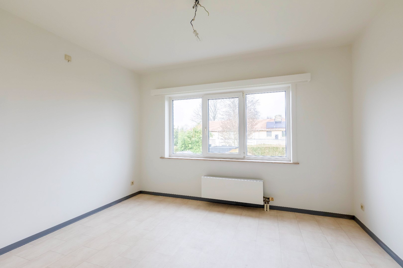 Gunstig gelegen instapklare woning in rij met garage en toffe tuin 