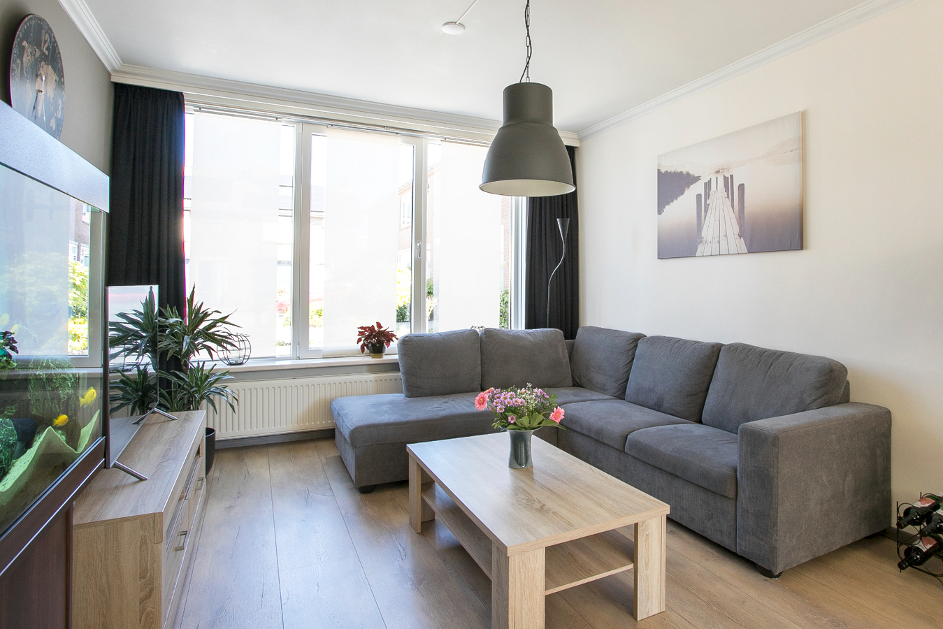 Instapklare eindwoning met 3 slaapkamers en grote zolderverdieping, berging en zonnige achtertuin. 