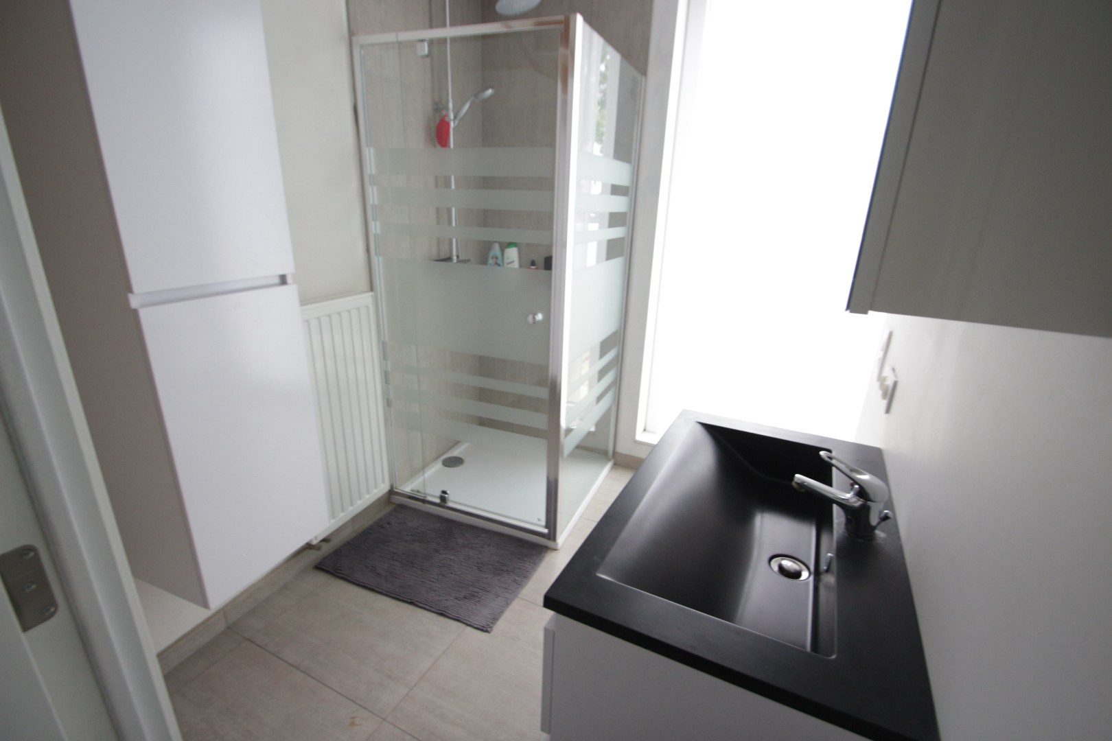 Centraal gelegen dakappartement met één slaapkamer en garage 