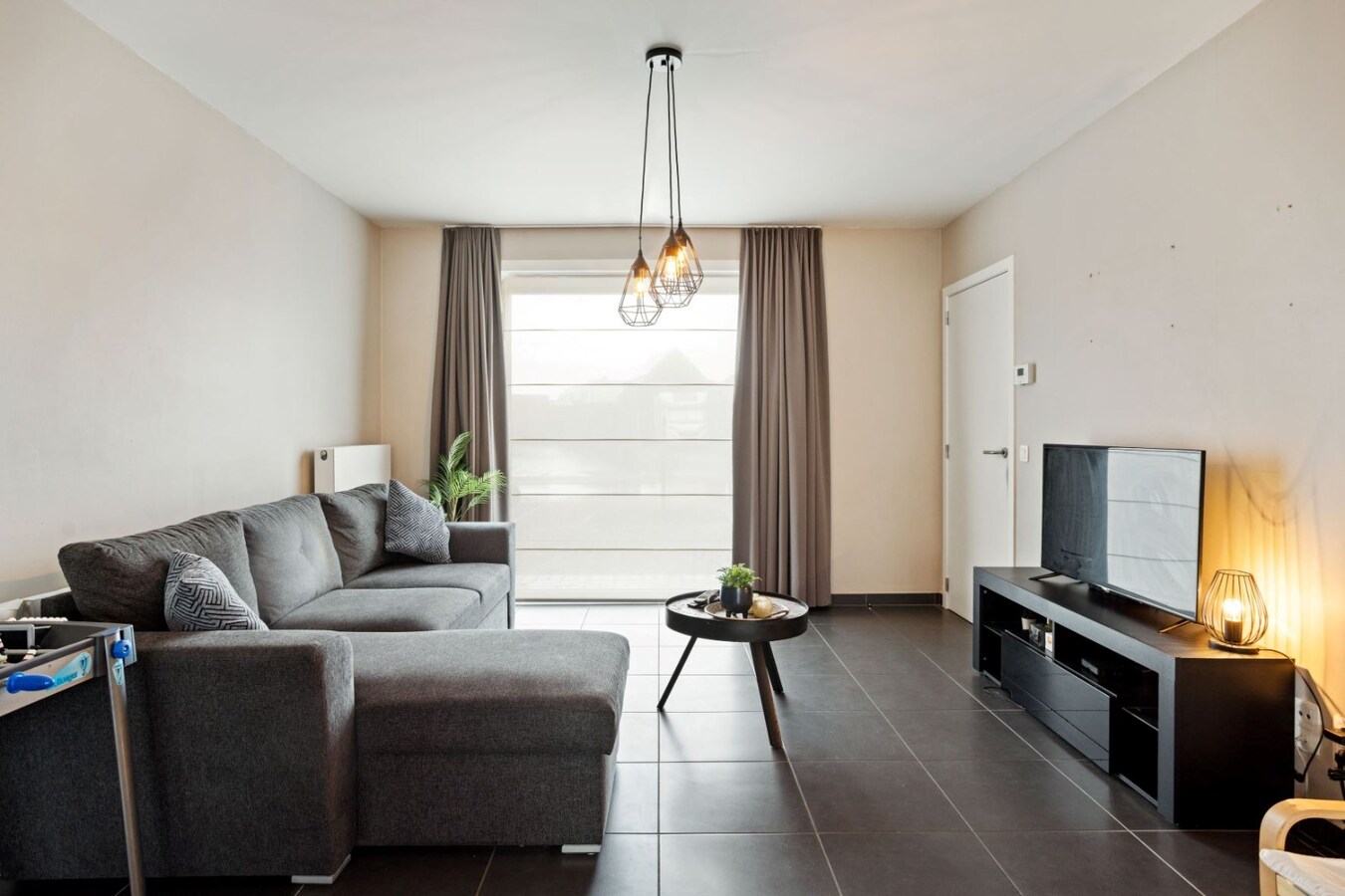 Centraal gelegen, halfopen woning met zonnige tuin 