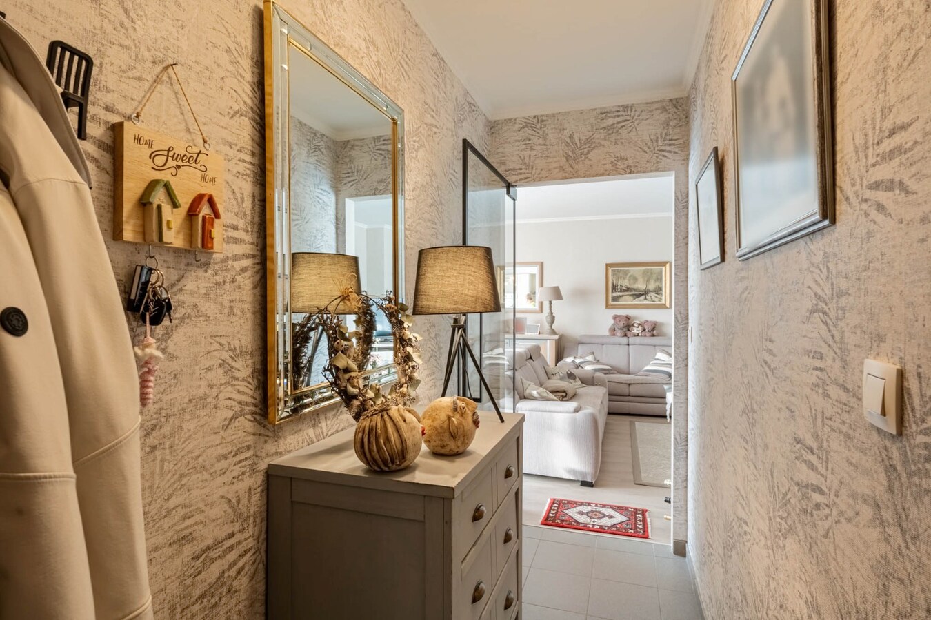 Comfortabel investeringsappartement met 2 slaapkamers en garage, in dorpskern 