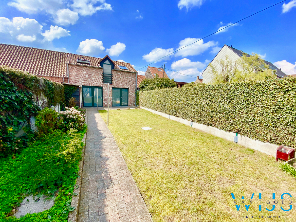 Ruim 2 slaapkamerappartement met zonneterras &amp; garage in hartje ERTVELDE! 