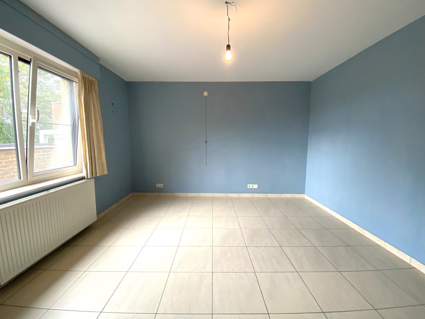 Instapklaar en ruim appartement met zonnig terras in hartje Wakken! 
