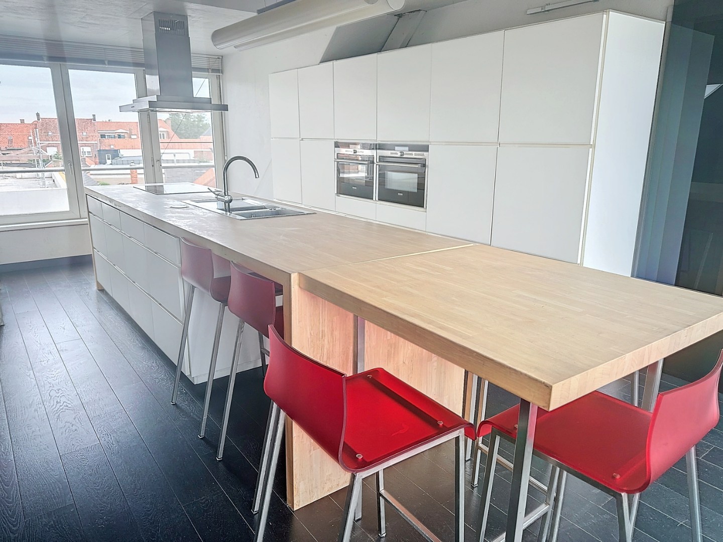 Opbrengsteigendom bestaande uit 3 appartementen + handelsgelijkvloers gelegen in het centrum 