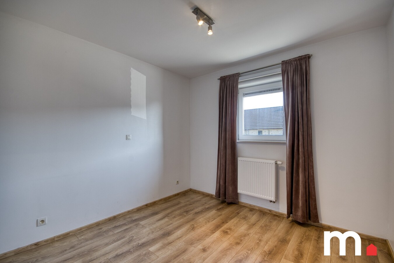 Instapklare gezinswoning in rustige verkaveling te Heule ! 