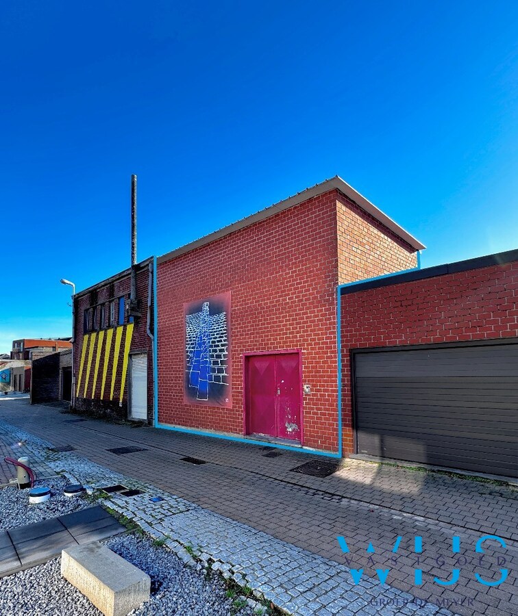 Karaktervol handelspand met woonst op topligging in Assenede! 