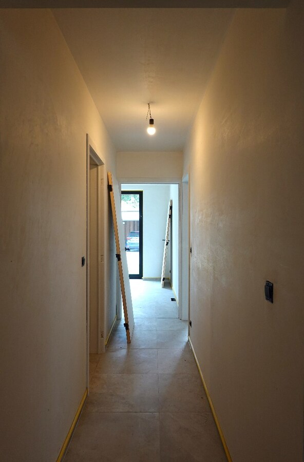 Prachtig nieuwbouwappartement van 108,43 m² met autostaanplaats op uitstekende ligging in hartje Jabbeke 