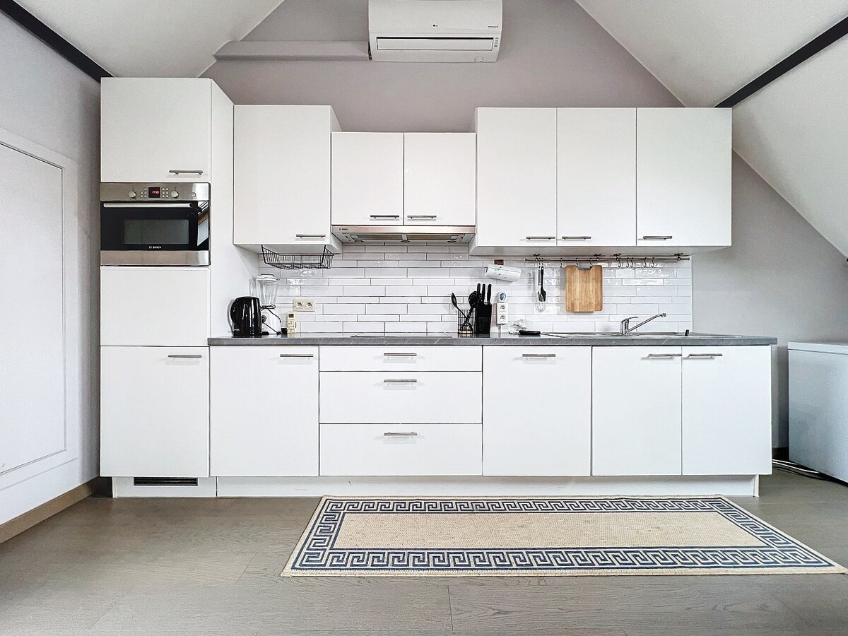 Tof dakappartement met garage te Herzele 