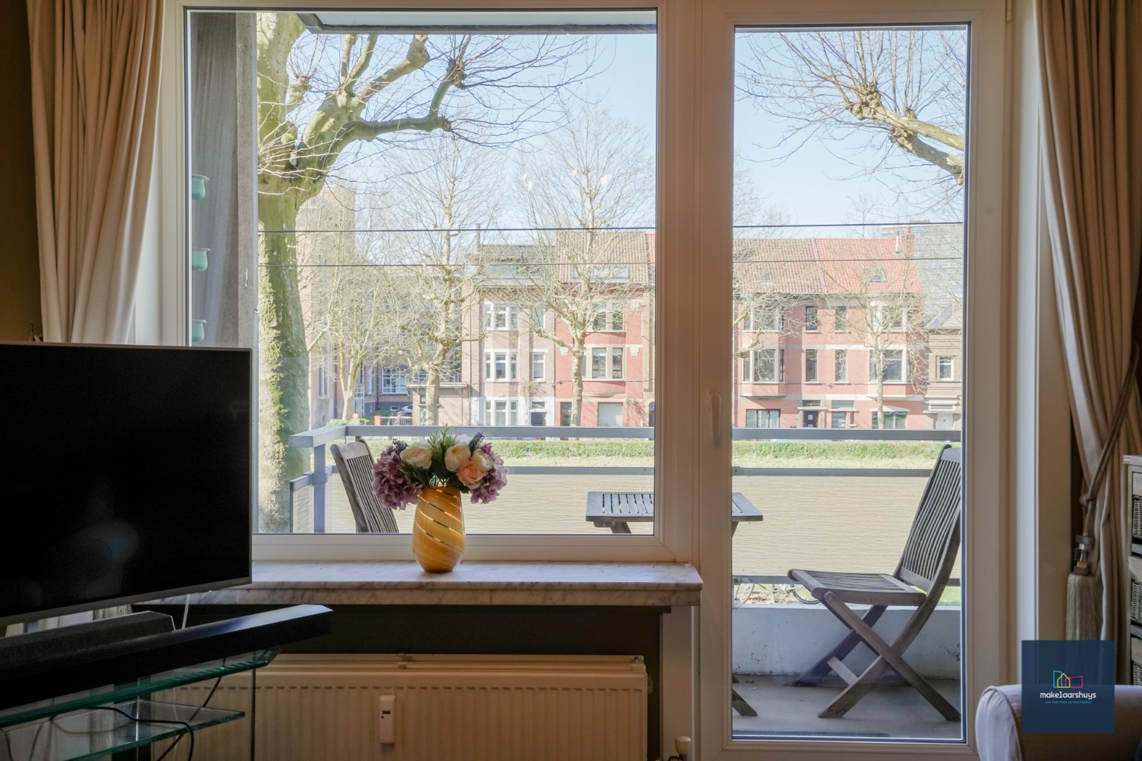 Stijlvol 1 slaapkamer appartement met 2 terrassen, kelder en garagebox 