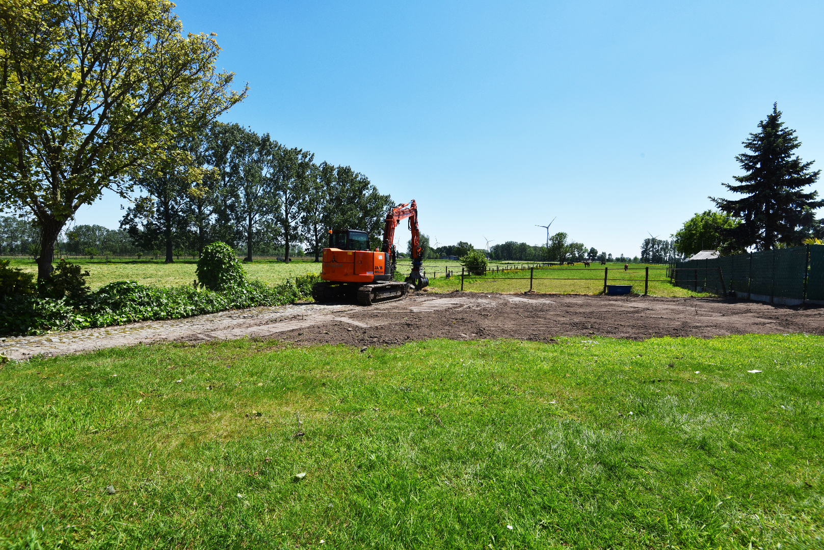 Op te frissen woning op 1.029m² met zicht op de velden te Kaprijke 