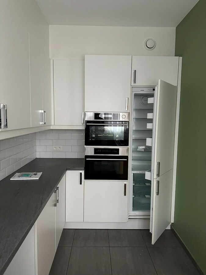 Gelijkvloersppartement met 3 slpk, dubbele garage, tuin en ruime kelder (120 m²) 