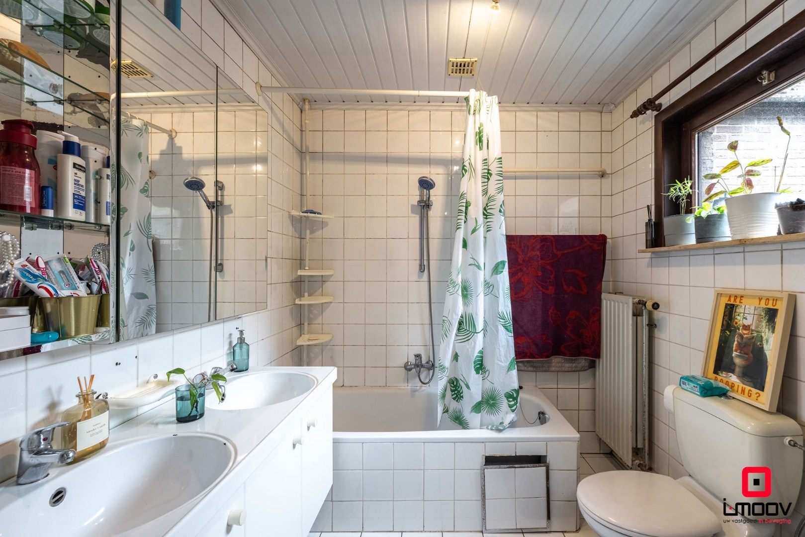 Karaktervolle stadswoning met uitzonderlijke breedte en garage in hartje Gent 