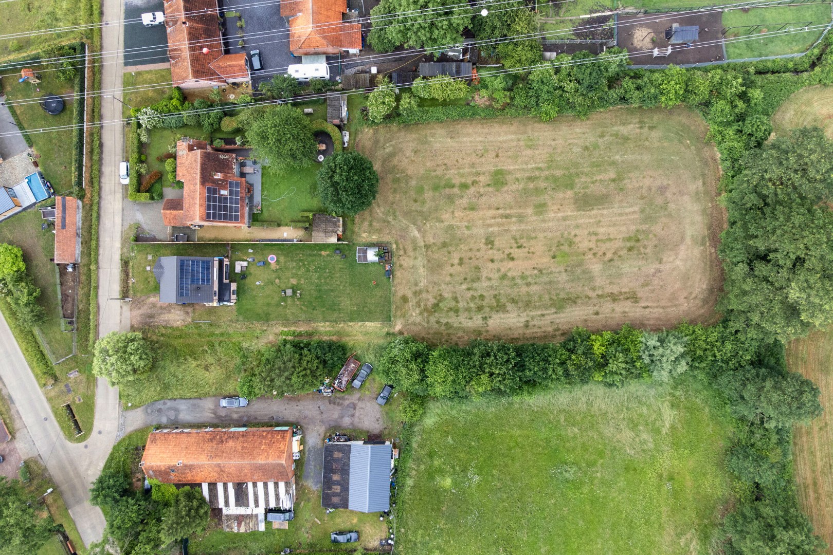 Bouwgrond voor open bebouwing met achterliggend weiland op 4.581 m² in Olmen 