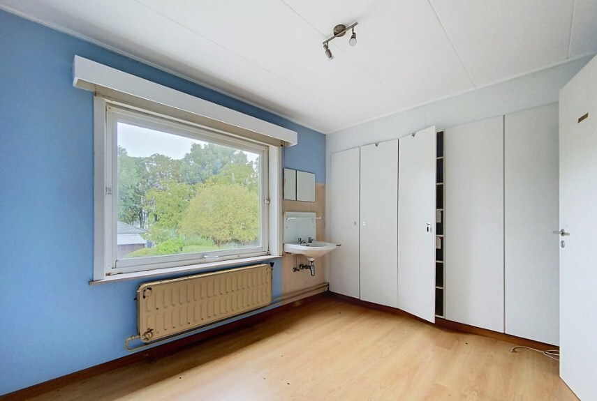Ruime half open bebouwing met tuin en garage in Heist-aan-Zee. 