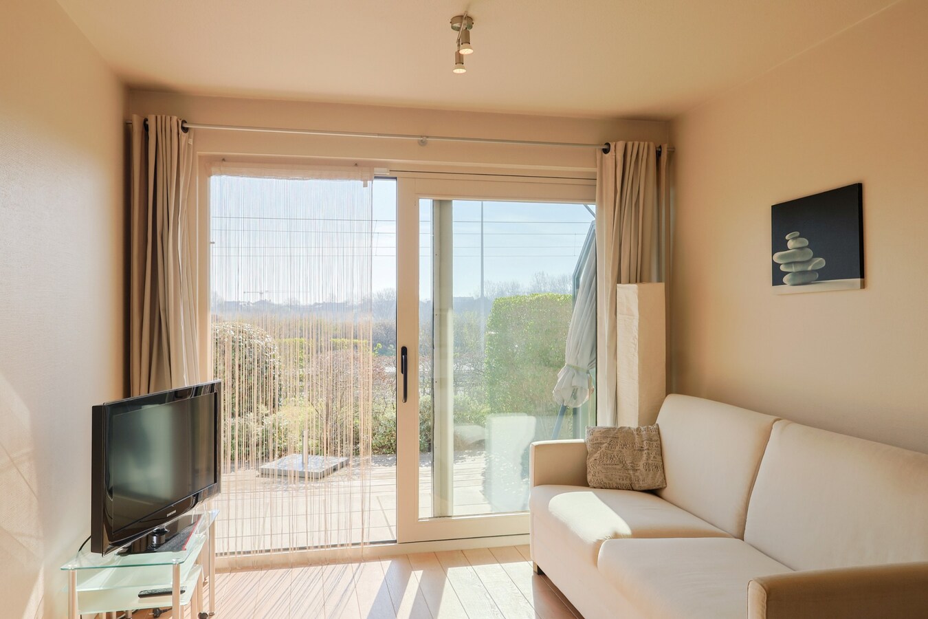 Zuidgericht gelijkvloers 1slpk appartement met zonneterras en duinenzicht nabij zee 