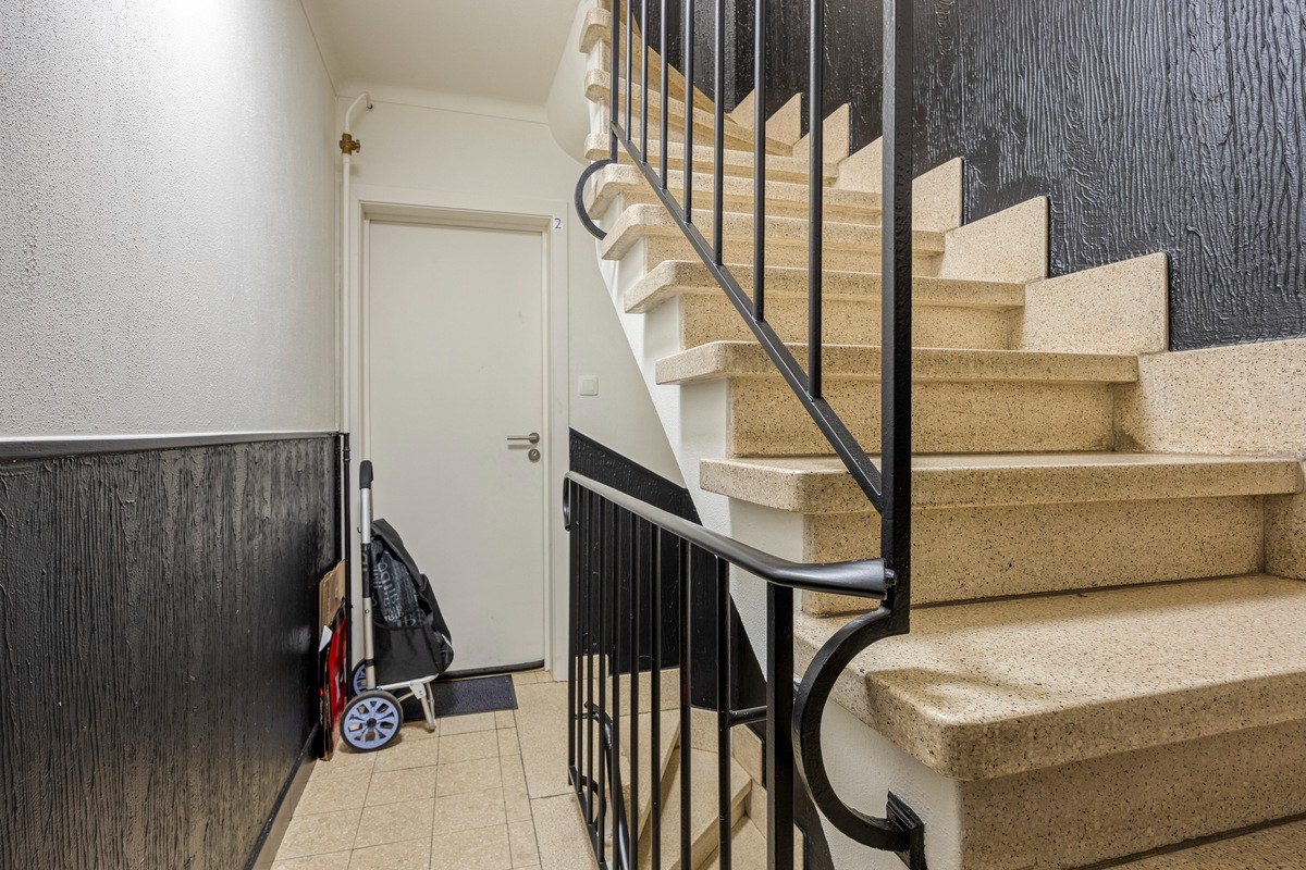 Opbrengsteigendom met handelspand en 3 appartementen te koop in Heverlee op een super ligging! 