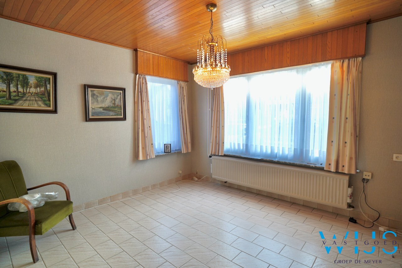 Halfopen bebouwing met vernieuwd dak en topligging in hartje Evergem ! 