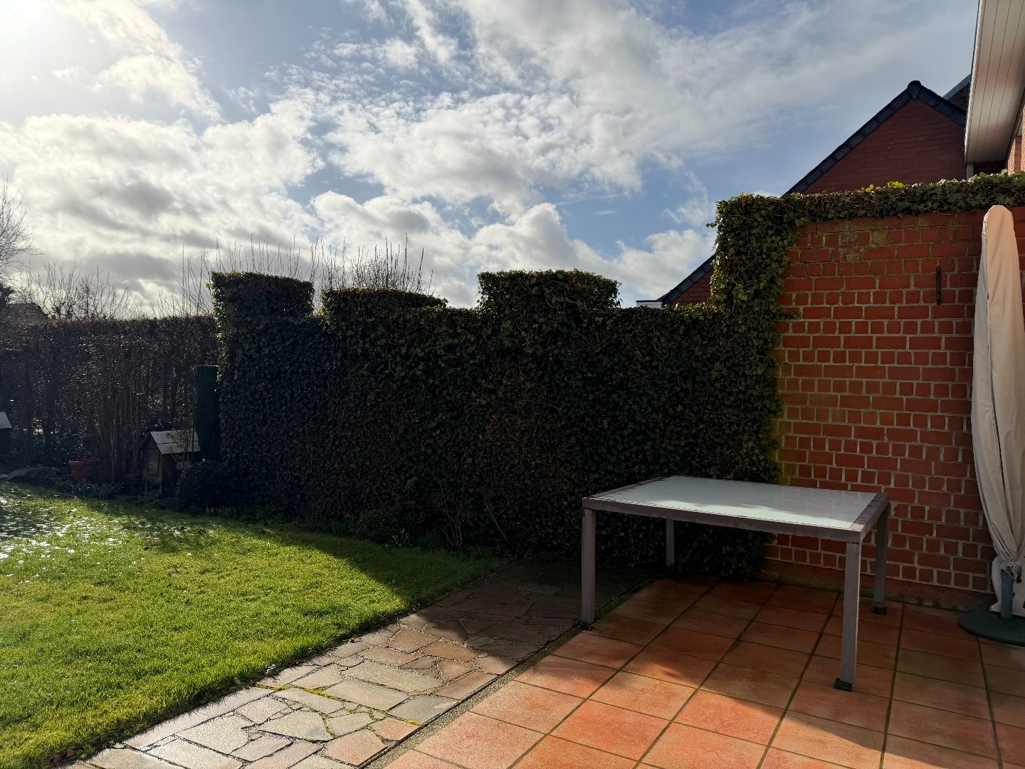 Halfopen woning met 3 slaapkamers,  garage en een ruime tuin te Zulte 