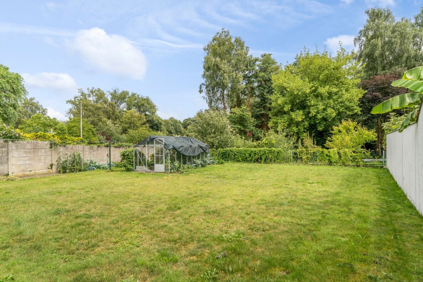 Halfvrijstaande gezinswoning op een ruim perceel van 13a80ca op wandelafstand van het centrum van Opoeteren! 