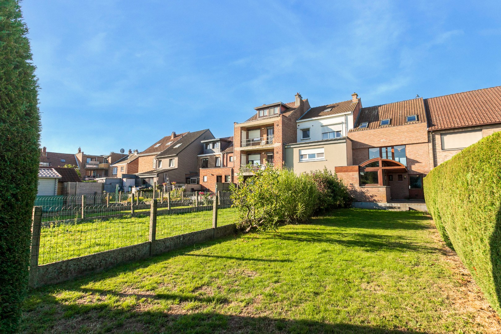 Karaktervolle architectenwoning (EPC B) met 3 slpks, garage en tuin te Lot 