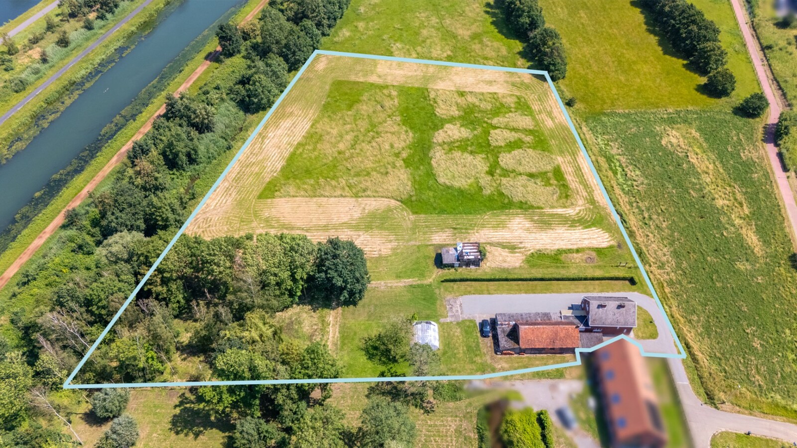 Vrijstaande woning op uitzonderlijk perceel van 16.135 m² te Duffel 