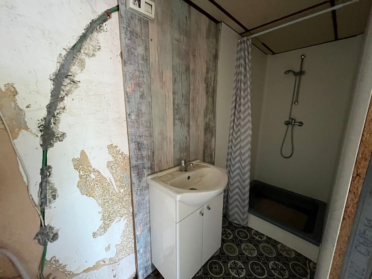 Te renoveren half open bebouwing te Gavere 