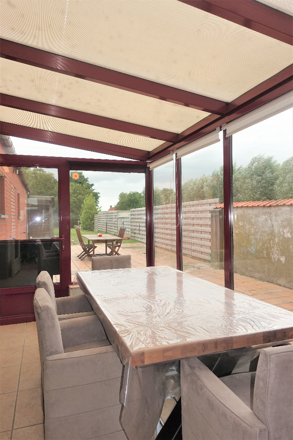 Half-open woning met grote tuin te Aartrijke 