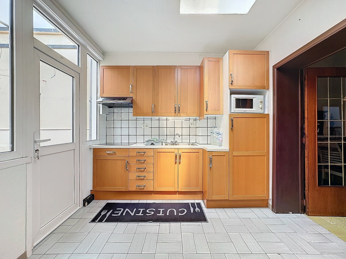 Centraal gelegen, instapklare woning met tuin te Lembeek 