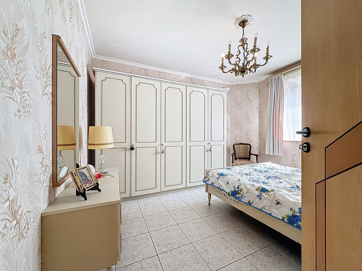 Energiezuinig gelijkvloersapp. met tuintje en garage te centrum Wetteren 