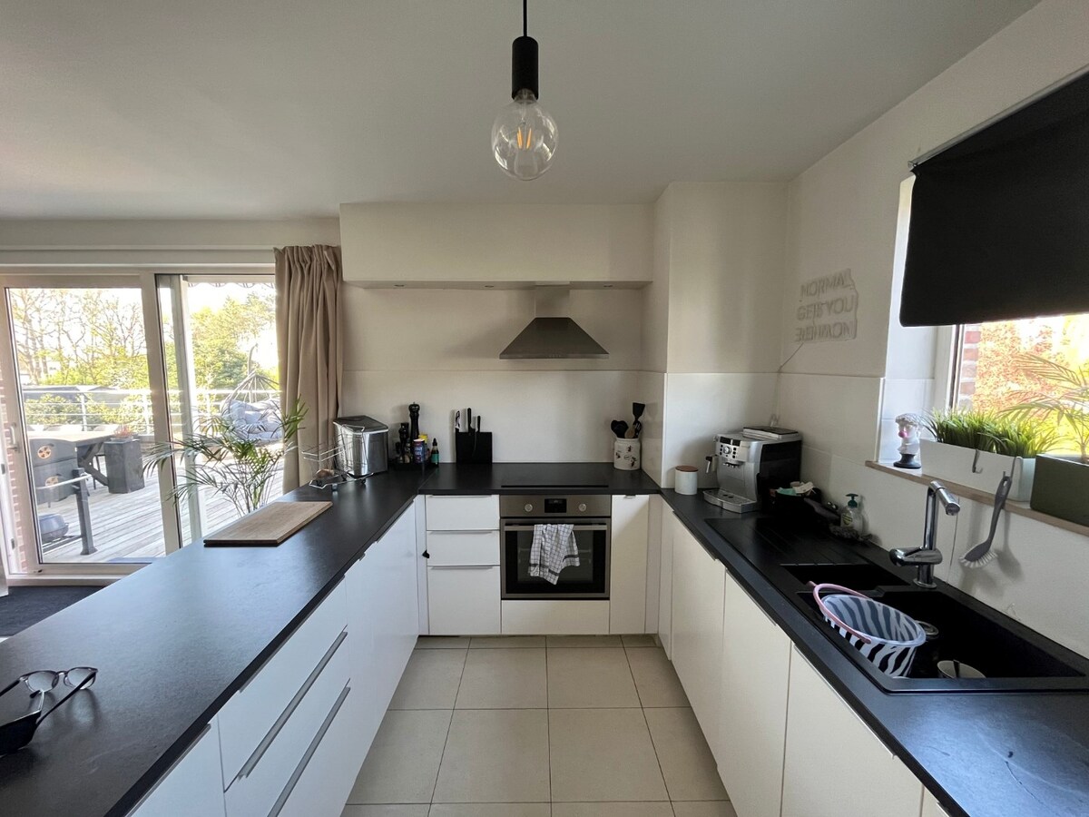 Tijdloos appartement met uitzonderlijk ruim terras 