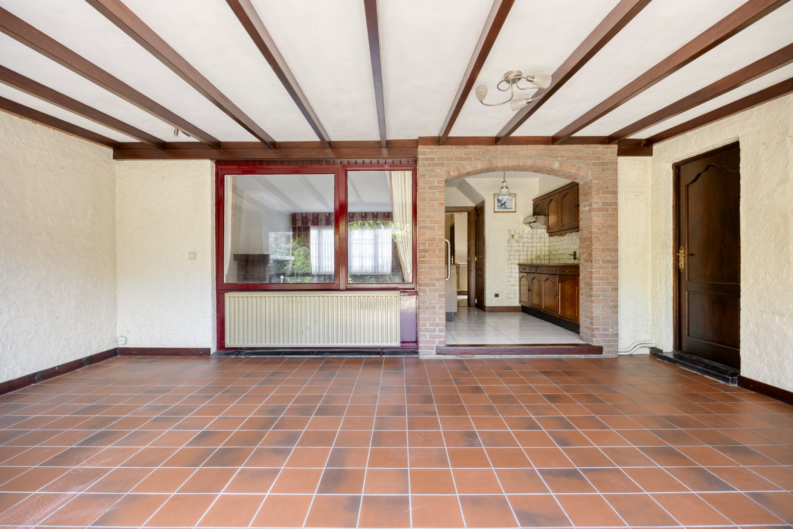 Veranda met doorgang keuken
