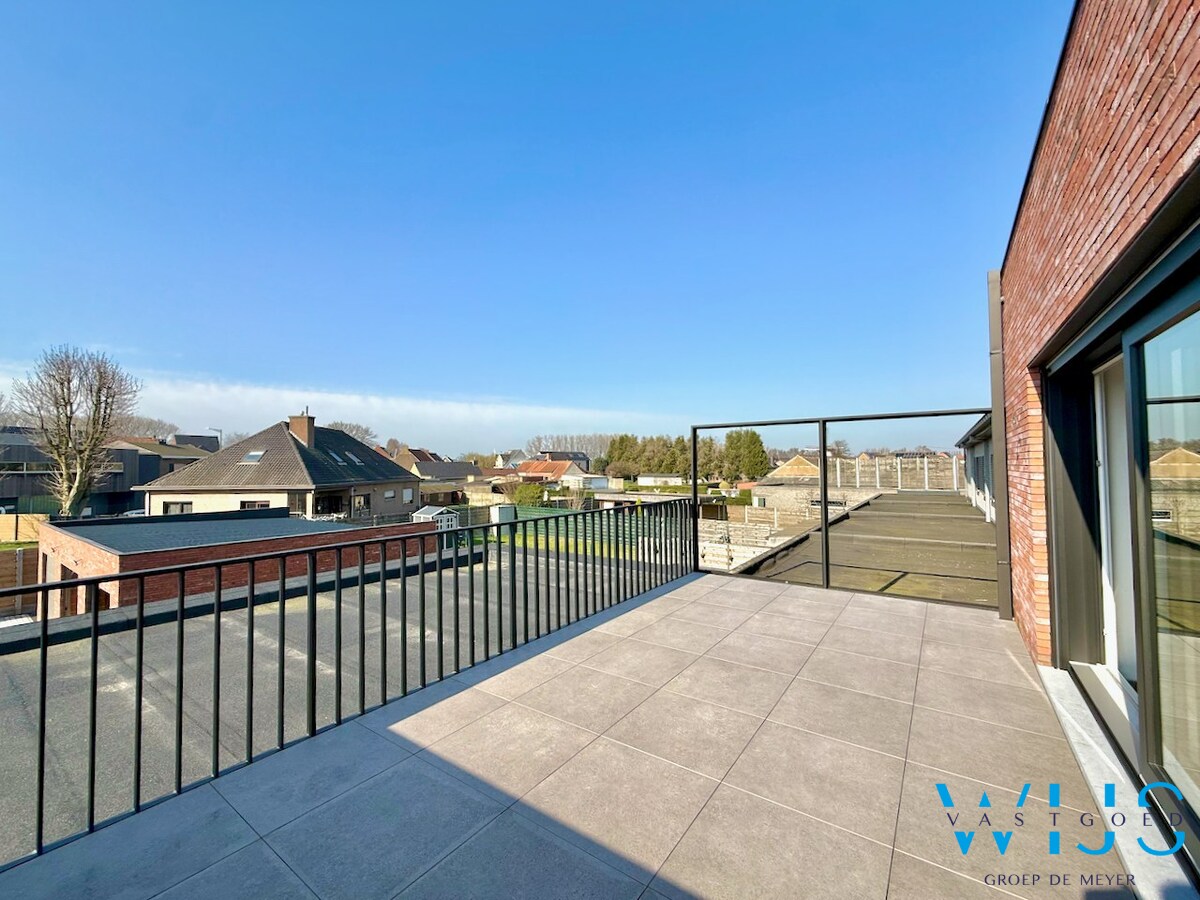 Drieslaapkamer appartement met garage in hartje Ertvelde ! 