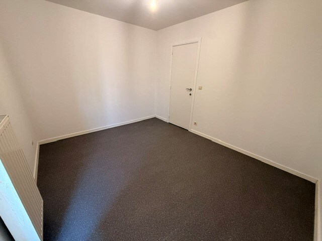 Verzorgd appartement met 1 slaapkamer, terras en lift in het centrum van Maaseik. 